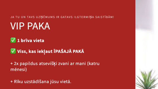 Laptop on a desk with a red promotional banner on the left side.